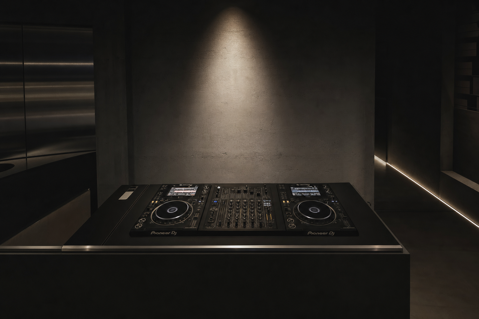 Premium DJ setup in a luxury venue with architectural lighting